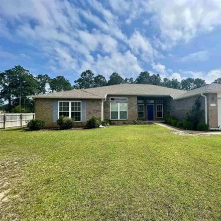 Rent this 4 bed house on 7267 Codell Street in Navarre, FL 32566