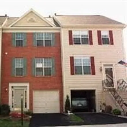 Rent this 3 bed townhouse on 8872 Moat Crossing Place in Linton Hall, VA 20136
