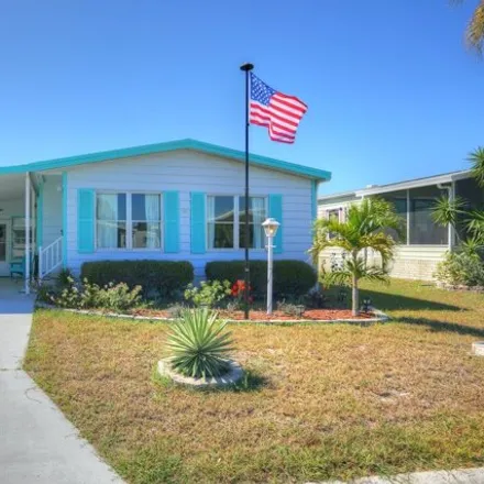 Buy this studio apartment on 411 Puffin Drive in Brevard County, FL 32976