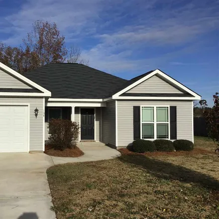 Rent this 3 bed townhouse on 104 Ellington Court in Perry, GA 31069