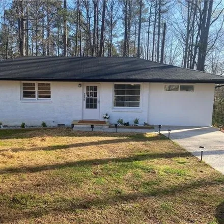 Buy this 4 bed house on 4030 Stonewall Tell Road in Atlanta, GA 30349
