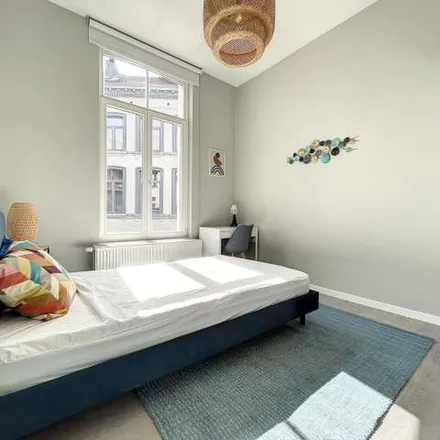 Rent this 9 bed apartment on Rue de Spa - Spastraat 52 in 1000 Brussels, Belgium