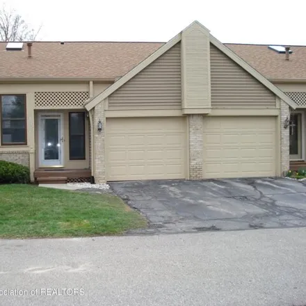 Buy this 2 bed condo on 6512 Brook Trail in Delta Charter Township, MI 48917