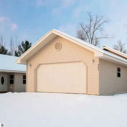 Buy this 2 bed house on 9842 Deer Track Court in Green Lake Township, MI 49643