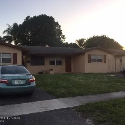 Buy this 5 bed house on 5664 Northwest 14th Street in Lauderhill, FL 33313