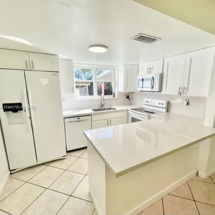 Rent this 3 bed apartment on 6576 Southwest 132nd Court in Kendale Lakes, Miami-Dade County