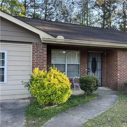 Rent this 3 bed townhouse on 2580 Teakwood Lane in Riverdale, GA 30296