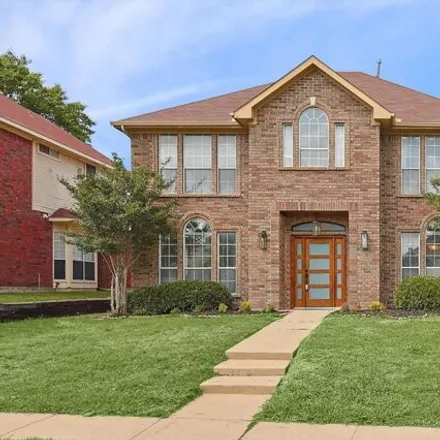 Buy this 4 bed house on 2181 Stonegate Drive in Carrollton, TX 75010