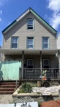 Buy this 4 bed house on 277 Oak Street in Perth Amboy, NJ 08861