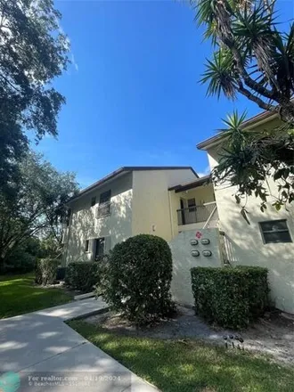 Buy this 3 bed condo on 3338 Cocoplum Circle in Coconut Creek, FL 33063
