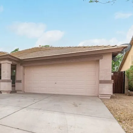 Buy this 4 bed house on 12867 West Lewis Avenue in Avondale, AZ 85392