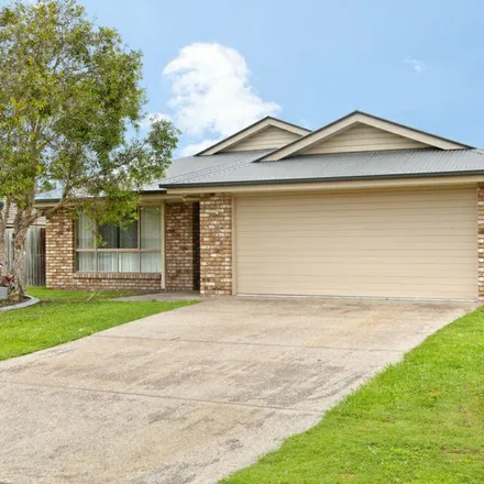 Rent this 4 bed apartment on 13 Sandpiper Circuit in Eagleby QLD 4130, Australia
