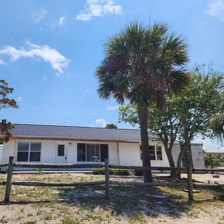 Rent this 2 bed house on 5104 Beach Dr in Panama City, Florida