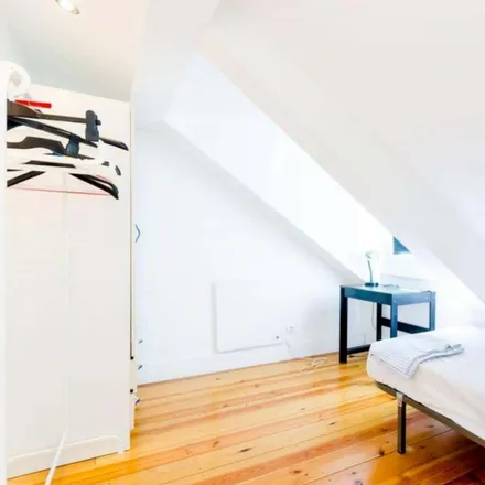 Rent this 4 bed room on Airbnb in Rua do Carrião, 1150-251 Lisbon