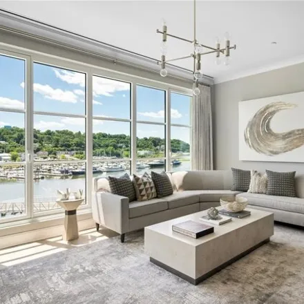 Buy this 3 bed condo on The Beacon at Garvies Point Pool in Glen Cove Esplanade, Glen Cove Landing