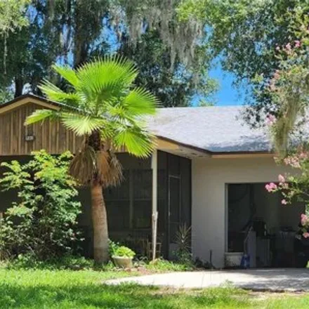 Buy this 4 bed house on 711 Sunset Ave in Orange City, Florida