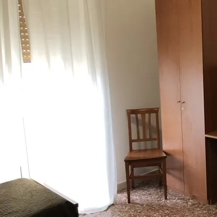 Rent this 1 bed room on Via Roberto Sanseverino in 42, 00176 Rome RM