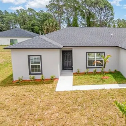 Buy this 3 bed house on 564 Whitehall Avenue Southwest in Palm Bay, FL 32908