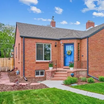 Buy this 4 bed house on 6980 East 16th Avenue in Denver, CO 80220