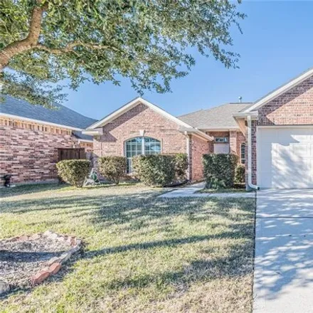 Rent this 3 bed house on 3047 Cimarron Pass Drive in Harris County, TX 77373