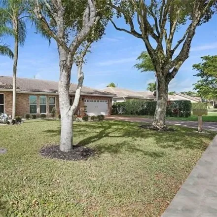 Buy this 4 bed house on 5438 Northwest 60th Drive in Coral Springs, FL 33067