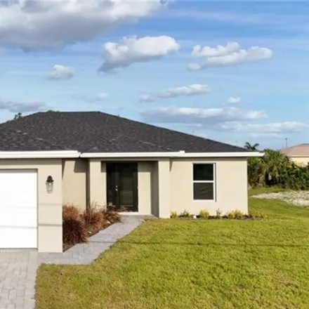 Rent this 4 bed house on 3033 Northeast 1st Avenue in Cape Coral, FL 33909