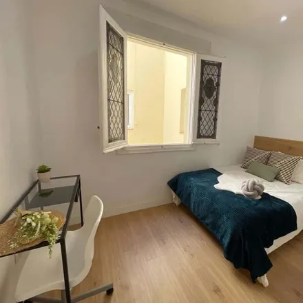 Rent this 12 bed room on Madrid in Escuela Profesional Javeriana, Calle de Alberto Aguilera