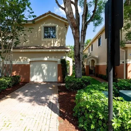 Rent this 4 bed townhouse on 4060 Timber Cove Lane in Weston, FL 33332