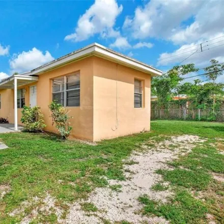 Buy this 3 bed house on 5620 SW 40th Ct in West Park, Florida