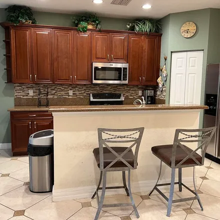 Rent this 3 bed apartment on Bonsai Circle in Palm Beach Gardens, FL