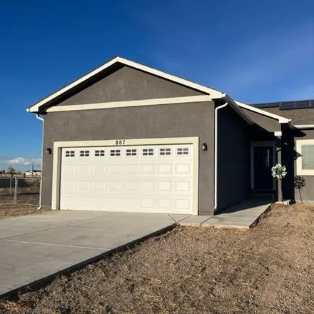 Buy this 4 bed house on 869 East Cholla Drive in Pueblo County, CO 81007