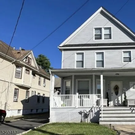 Buy this 4 bed house on 912-914 W 4th St in Plainfield, New Jersey