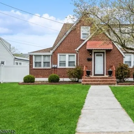 Buy this 4 bed house on 230 N 3rd Ave in Manville, New Jersey