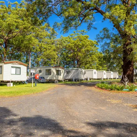 Rent this 4 bed apartment on Twilight Caravan Park in Manning River Drive, Taree South NSW 2430