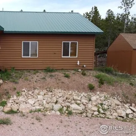 Buy this 2 bed house on 2038 Mosquito Drive in Larimer County, CO 80545