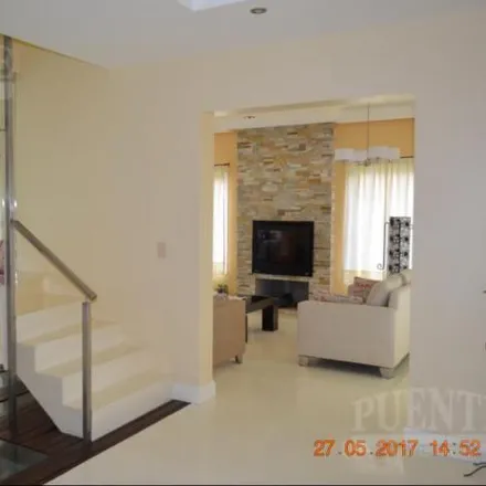 Buy this 4 bed house on unnamed road in Partido de Esteban Echeverría, 1807 Canning