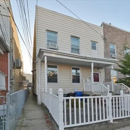 Buy this 7 bed house on 53-16 Haspel Street in New York, NY 11373