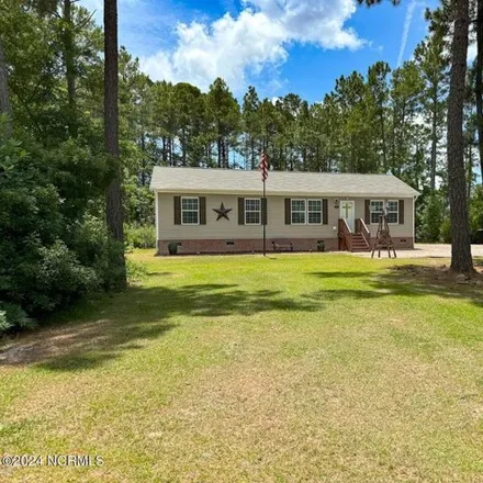 Buy this 3 bed house on 443 Island Creek Dr in Wilmington, North Carolina