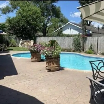 Rent this 4 bed house on 8501 Wynlea Street in Houston, TX 77061