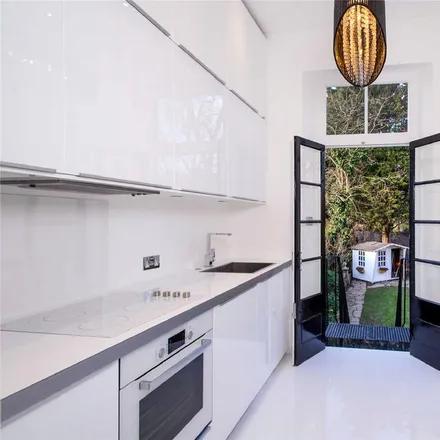 Rent this 4 bed house on 23 Blenheim Road in London, NW8 0AU