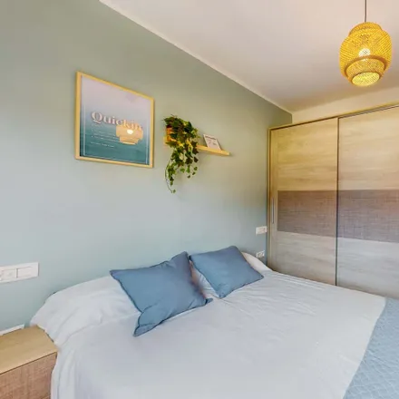 Rent this 4 bed room on Carrer de Sant Joan de Déu in 1, 46011 Valencia