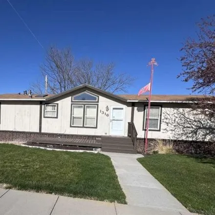 Buy this 4 bed house on 1340 11th Avenue in Sunflower Mobile Home Park, Mitchell