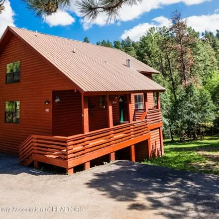 Buy this 4 bed house on 405 Flume Canyon Drive in Ruidoso, NM 88345
