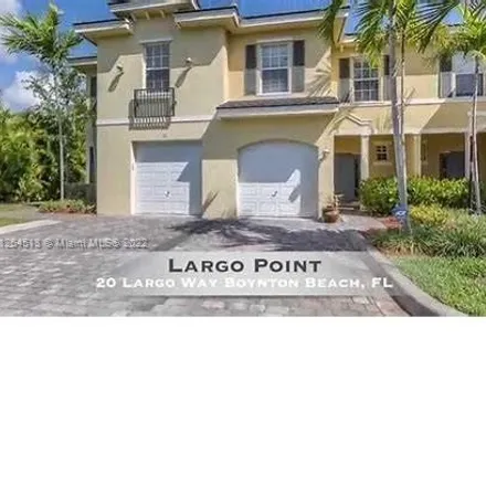 Rent this 3 bed townhouse on 251 Southwest 2nd Avenue in Boynton Beach, FL 33435