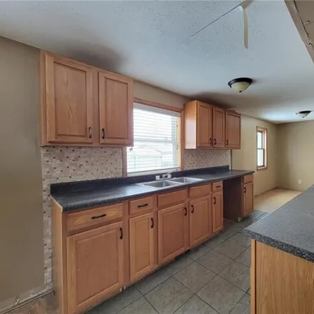 Image 4 - 534 5th Street Southwest, Chisholm, MN 55719, USA - House for sale