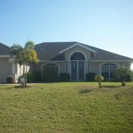 Buy this 3 bed house on 7 NW 13th Pl in Cape Coral, Florida