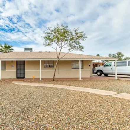 Buy this 4 bed house on 3835 West Lynwood Street in Phoenix, AZ 85009