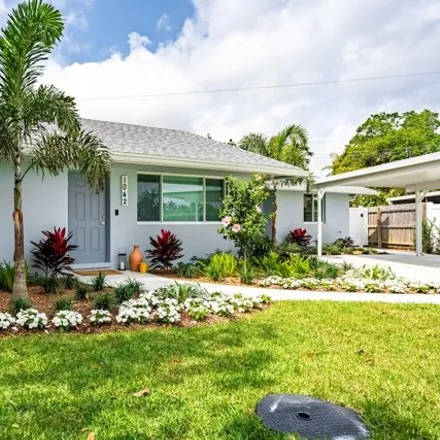 Buy this 4 bed house on 5807 Churchill Circle West in West Palm Beach, FL 33405