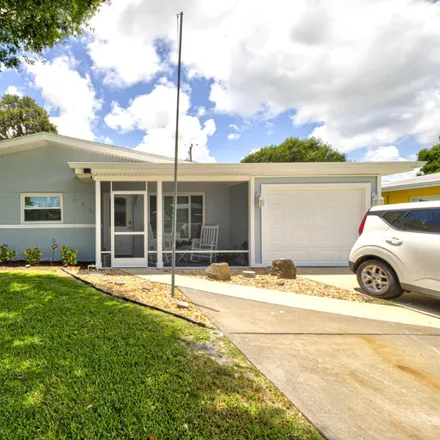 Buy this 3 bed house on 2451 Pawnee Drive in Melbourne, FL 32935