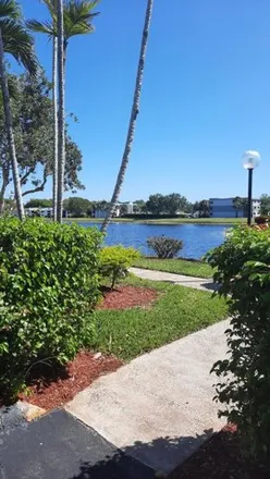 Rent this 2 bed condo on 15261 Lakes of Delray Boulevard in County Club Acres, Palm Beach County